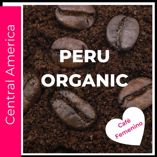 Peru Organic Coffee lettering on top of rich brown roasted coffee.  A title page image to click into the various size and consistency options available for this specialty grade coffee origin. This is a picture of coffee beans sitting on ground coffee on a bright hot pink flamingo colored background to denote this coffee comes from the main coffee growing region of Central America. A heart shape announces this is a Cafe Feminino coffee. An all women co-operative with the goal of quality and philanthropy.